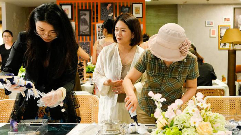 Taikang Life's Tapestry: Qipao and Tie-Dye in Modern Shenyang