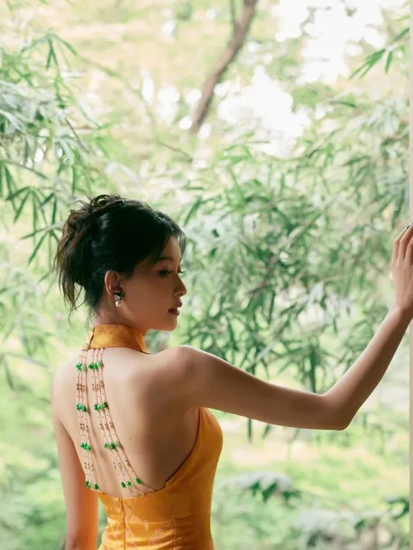 Can Yellow Qipao Outshine the Sun? Tradition Wears Modern Glamour