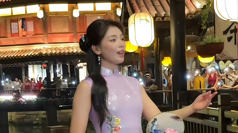 Liu Tao's Qipao Stroll Through Guzhen: A Symbol of Unyielding Spirit