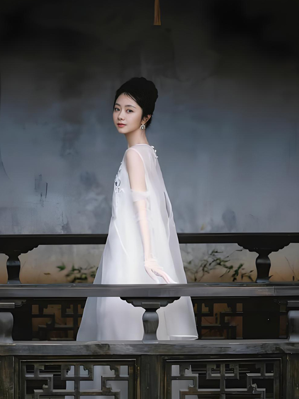 Tan Songyun: A White Silk Photoshoot at 35