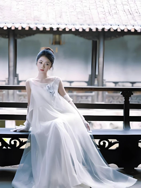 Tan Songyun: A White Silk Photoshoot at 35