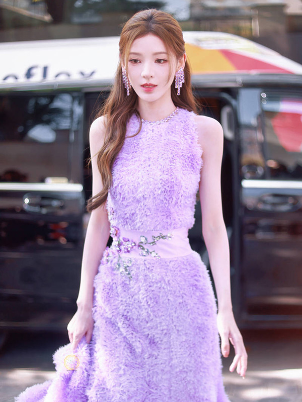 Zhang Yuxi Attends Paris Fashion Week in a Purple Gown