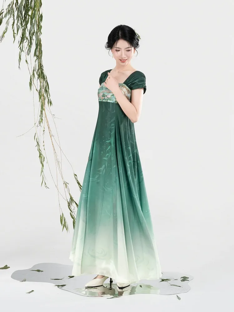 Full-length view with the willow branch beside her