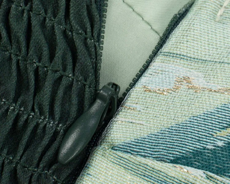 Pleated fabric and lacing detail of the qixiong bodice