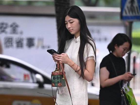 How Patent Leather Redesigns the Classic Qipao Shape