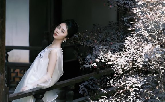 Tan Songyun: A White Silk Photoshoot at 35