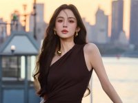 Nazha’s Chocolate Gown Against the Twilight Riverside Canvas