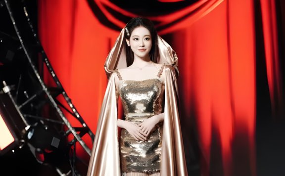 Zhu Xudan Shines in Golden Sequin Gown and Champagne Cape